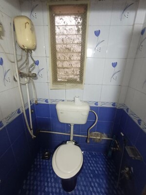 Bathroom in 2 BHK Apartment at Sai Baba Vihar Complex, Ghodbunder Road – for Rent