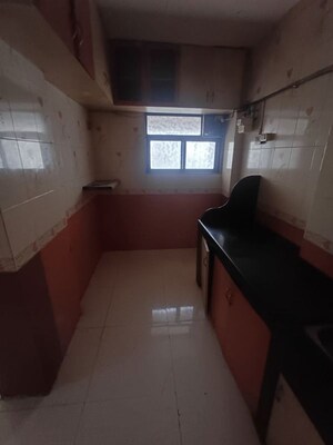 Kitchen in 2 BHK Apartment at Sai Baba Vihar Complex, Ghodbunder Road – for Rent