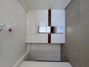 Bathroom in 2 BHK Apartment at Bhartiya Nikoo Homes Phase 2, Thanisandra Main Road – for Rent