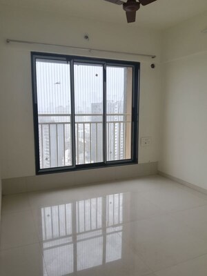 Room in 2 BHK Apartment at Oxford Navrang Crystal, Goregaon West – for Rent