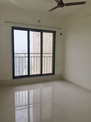 Room in 2 BHK Apartment at Oxford Navrang Crystal, Goregaon West – for Rent