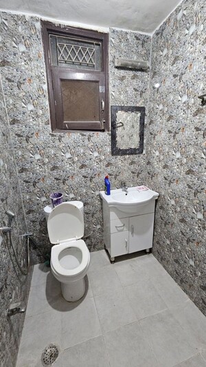 Bathroom in 2 BHK Builder Floor at Freedom Fighters Enclave – for Rent
