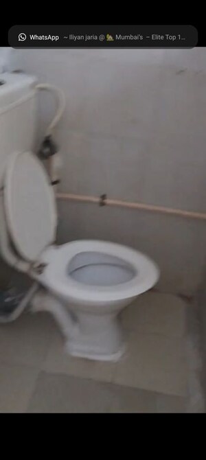 Bathroom in 2 BHK Apartment at New Mhada Towers, Andheri West – for Sale