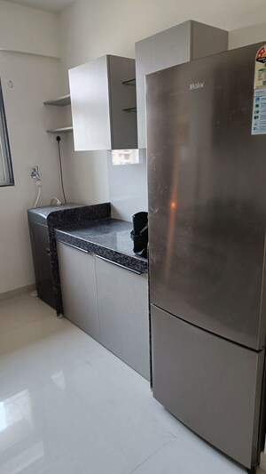 Kitchen in 2 BHK Apartment at Ashar Axis, Majiwada – for Rent