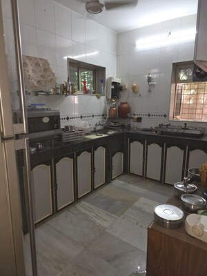 Kitchen in 2 BHK Apartment at Juhu Darshan CHS, Andheri West – for Rent