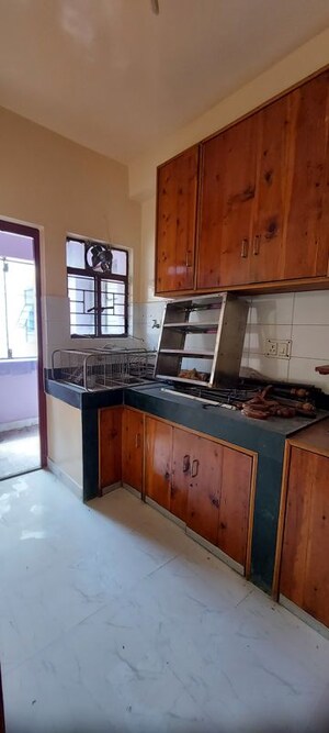 Kitchen in 3 BHK Apartment at Merlin Trinoyoni, Behala – for Sale