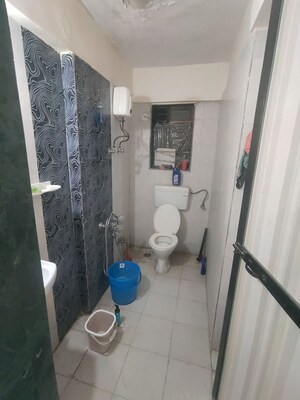 Bathroom in 2 BHK Apartment at Sudarshan CHS Parel, Parel – for Rent