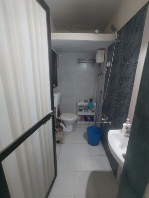 Bathroom in 2 BHK Apartment at Sudarshan CHS Parel, Parel – for Rent