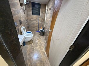 Bathroom in 2.5 BHK Apartment at Kalpavriksha Apartment, Vasant Vihar – for Rent