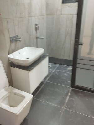 Bathroom in 4 BHK Builder Floor at Parsvnath City, Sector 8 – for Rent