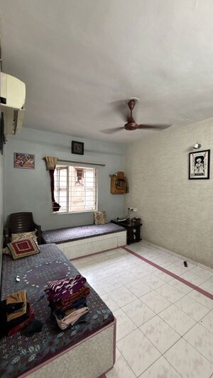 Living Room in 1 BHK Apartment at Satellite – for Sale