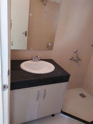 Bathroom in 2 BHK Apartment at Unitech Uniworld Gardens 2, Sector 47 – for Rent
