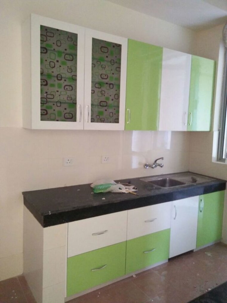 Kitchen, unitech-uniworld-gardens-2 2 Bedroom 900 Sq.Ft. Apartment In Sector 47 Gurgaon 10510325