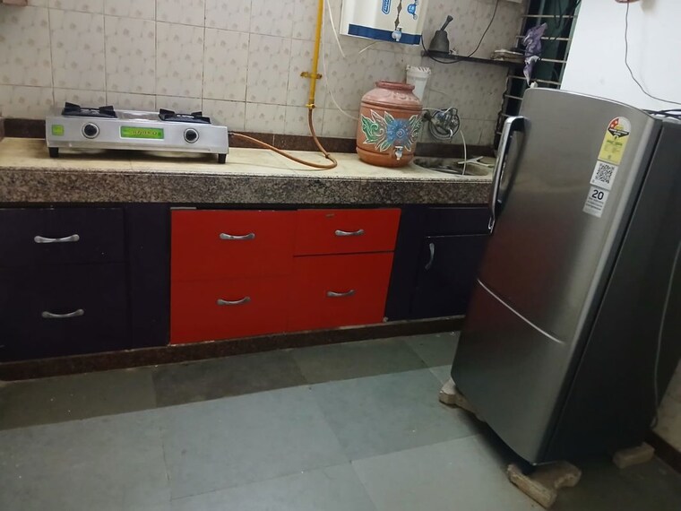 Kitchen, satellite 2 Bedroom 950 Sq.Ft. Villa In Satellite Ahmedabad 10510336