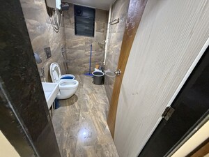 Bathroom in 2 BHK Apartment at Vasant Vihar – for Rent