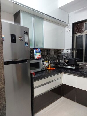 Kitchen in 1.5 BHK Apartment at Runwal Eirene, Balkum Pada – for Rent