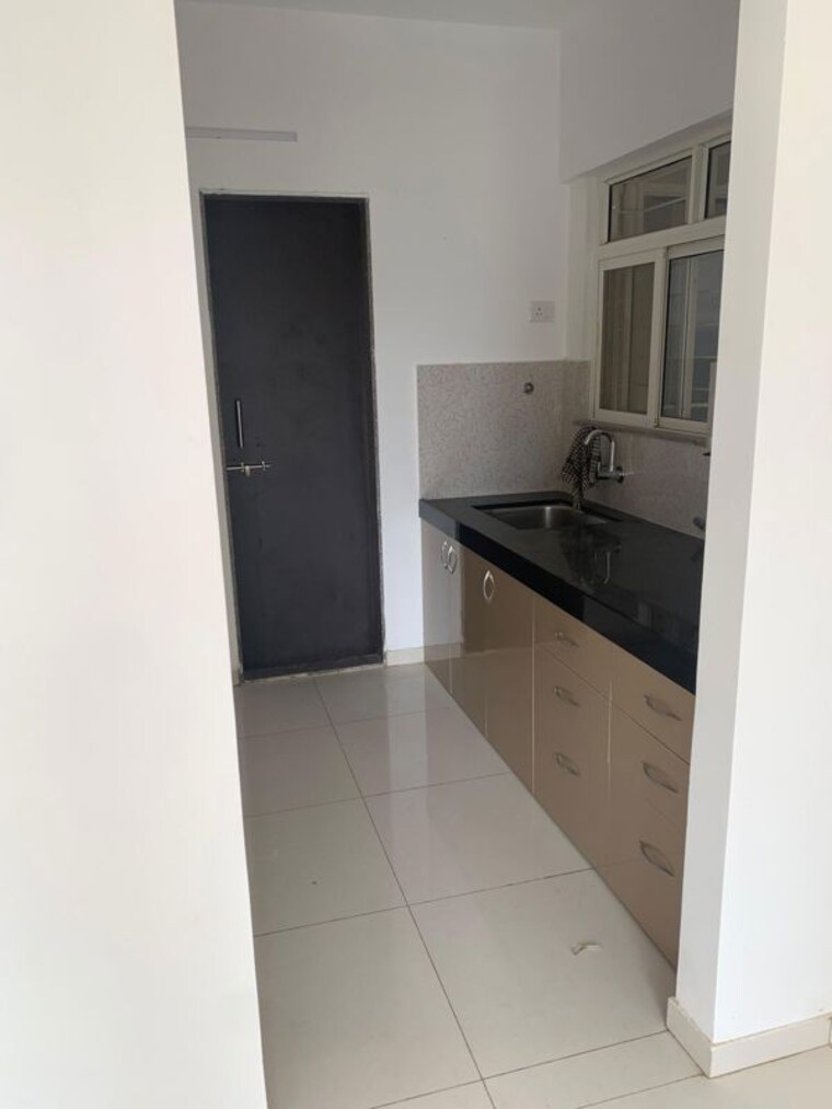 Kitchen, kolte-patil-western-avenue 2 Bedroom 750 Sq.Ft. Apartment In Wakad Pune 10511246