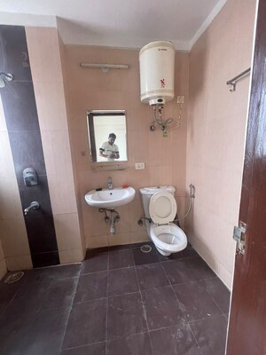 Bathroom in 3 BHK Apartment at Ramprastha City The Atrium, Sector 37d – for Rent