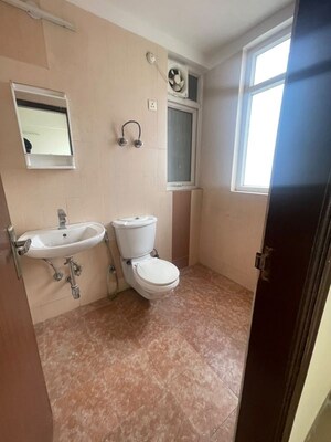 Bathroom in 3 BHK Apartment at Ramprastha City The Atrium, Sector 37d – for Rent