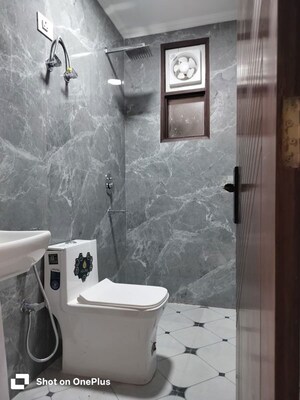 Bathroom in 4 BHK Builder Floor at Khirki Extension – for Rent