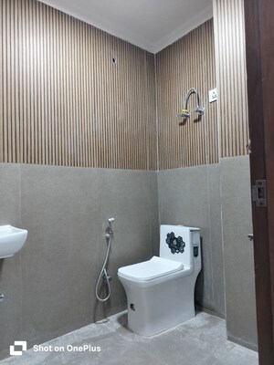 Bathroom in 4 BHK Builder Floor at Khirki Extension – for Rent
