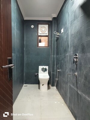 Bathroom in 4 BHK Builder Floor at Khirki Extension – for Rent