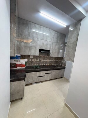 Kitchen in 2 BHK Apartment at Signature The Millennia 3, Sector 37d – for Rent