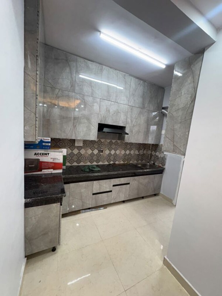 Kitchen, signature-the-millennia-3 2 Bedroom 800 Sq.Ft. Apartment In Sector 37d Gurgaon 10511776
