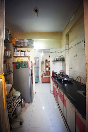 Kitchen in 2 BHK Apartment at Ghatlodia – for Sale