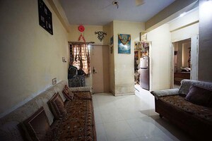Living Room in 2 BHK Apartment at Ghatlodia – for Sale