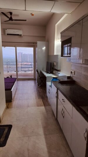 Kitchen in 1 RK Apartment at Paramount Golfforeste, Zeta I Greater Noida – for Rent