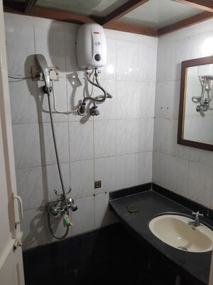 Bathroom in 2 BHK Apartment at Lake avenue CHS, Powai – for Rent