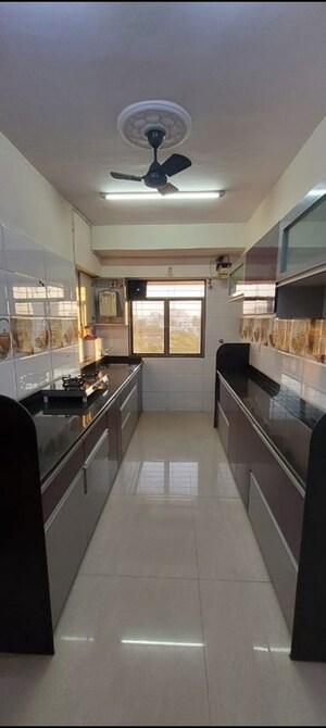 Kitchen in 2 BHK Apartment at Gokul Gardens – for Sale