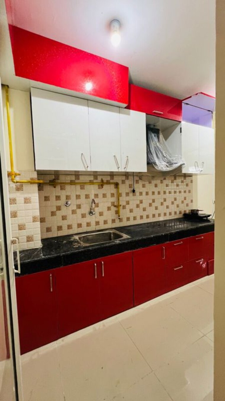 Kitchen, wave-dream-homes 3 Bedroom 990 Sq.Ft. Apartment In Wave City Ghaziabad 10512180
