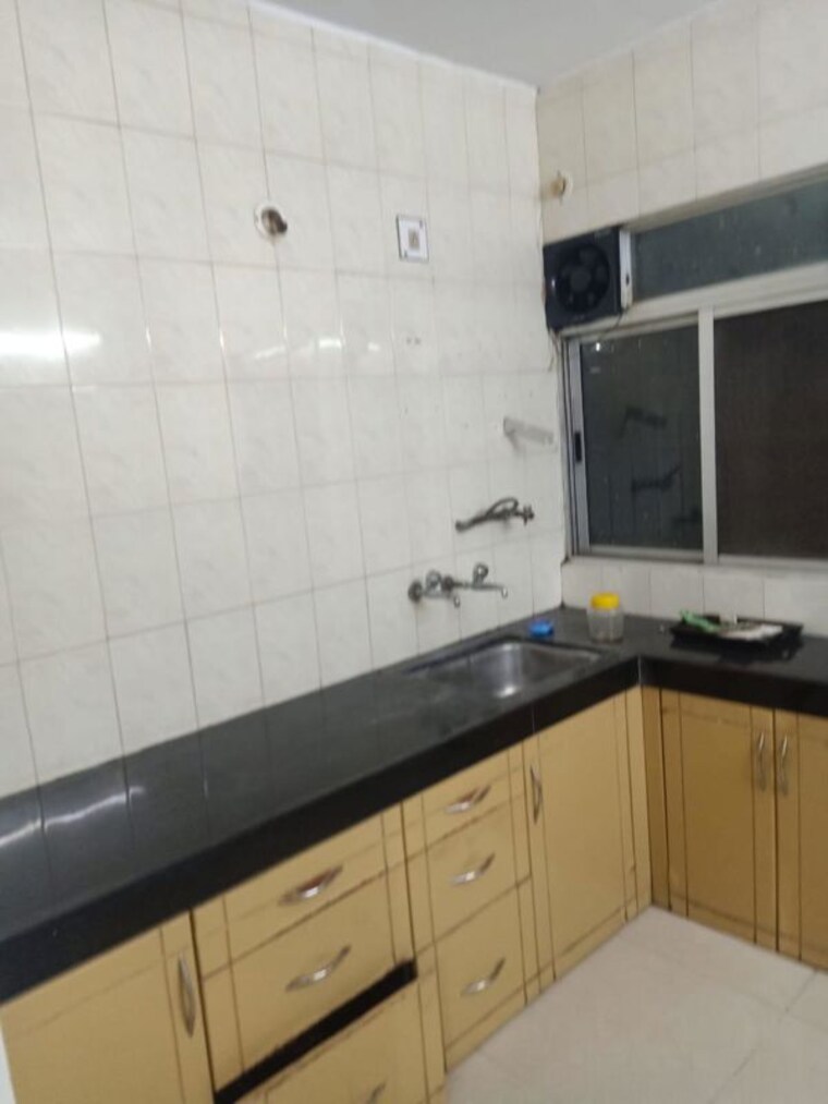 Kitchen, amanora-adreno-towers 1 Bedroom 623 Sq.Ft. Apartment In Hadapsar Pune 10512240