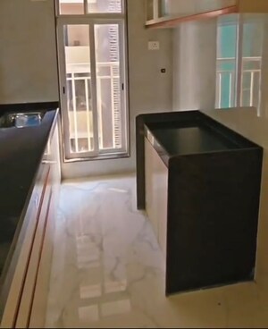 Kitchen in 2.5 BHK Apartment at Kosmos Kedar Darshan, Borivali West – for Sale
