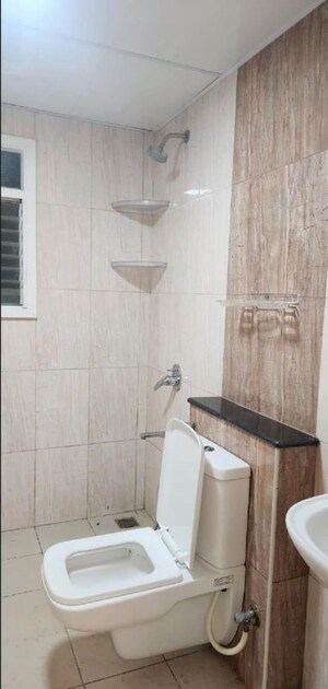 Bathroom in 3 BHK Apartment at Mantri Webcity, Hennur – for Rent