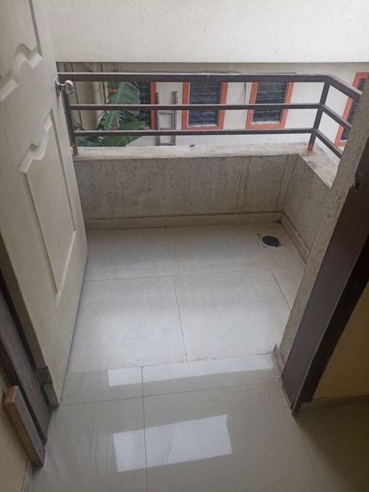 Balcony, tk-narmada-blue-sapphire 2 Bedroom 900 Sq.Ft. Apartment In Tathawade Pune 10512378
