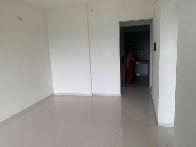 Living Room, kumar-47-east-a 2 Bedroom 850 Sq.Ft. Apartment In Magarpatta City Pune 10512438