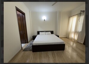 Bedroom in 3 BHK Builder Floor at Vasant Vihar – for Rent