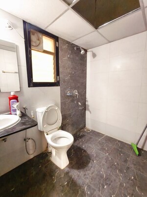 Bathroom in 3 BHK Apartment at Kolte Patil Margosa Heights, Mohammadwadi – for Rent