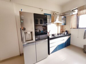 Kitchen in 3 BHK Apartment at Kolte Patil Margosa Heights, Mohammadwadi – for Rent