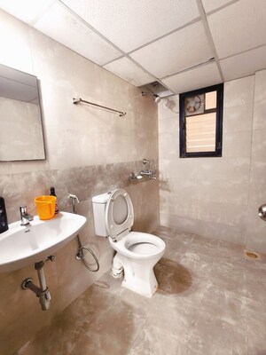 Bathroom in 3 BHK Apartment at Kolte Patil Margosa Heights, Mohammadwadi – for Rent