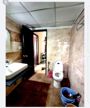 Bathroom in 3 BHK Apartment at Ananda The Ozone Heights, Tellapur – for Rent