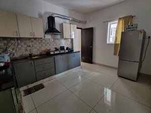 Kitchen in 3 BHK Apartment at Ananda The Ozone Heights, Tellapur – for Rent