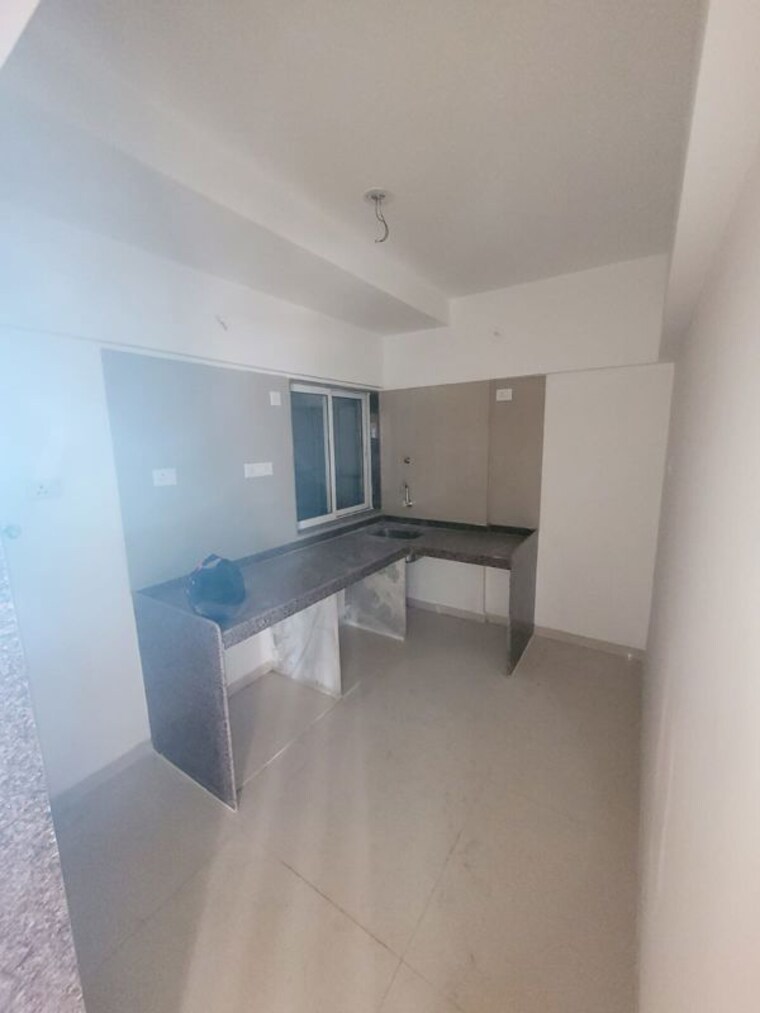 Kitchen, avant-hillway 2 Bedroom 756 Sq.Ft. Apartment In Goregaon East Mumbai 10512564