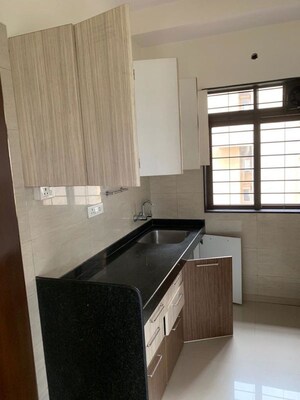 Kitchen in 2 BHK Apartment at Tilak Nagar Building, Tilak Nagar – for Rent