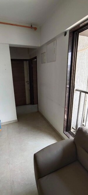Building Lobby in 2 BHK Apartment at New Ambivali, Andheri West – for Rent