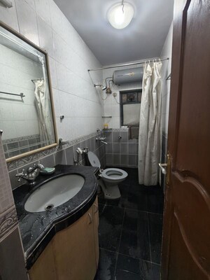 Bathroom in 2 BHK Apartment at Harshvardhan CHS Powai, Powai – for Rent