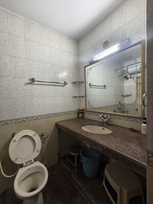 Bathroom in 2 BHK Apartment at Harshvardhan CHS Powai, Powai – for Rent